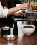 Heavy Duty 51mm Espresso Accessories Kit With Dual Head Coffee Distributor And Tamper WDT Tool And Magnetic Dosing Funnel on table