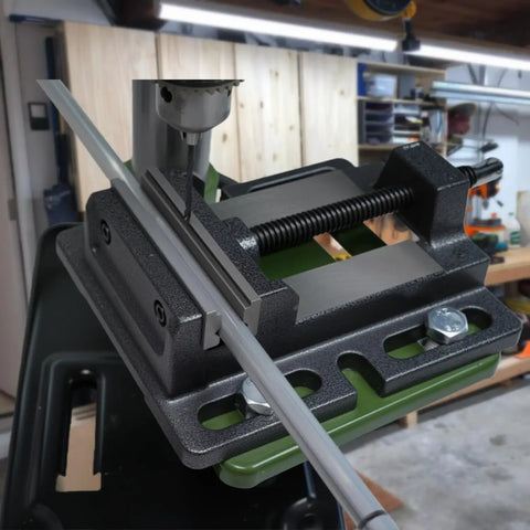 Heavy Duty 4 Inch Drill Press Vise With Soft Jaws For Scratch-Free Clamping installed on a workbench showcasing precise drilling setup