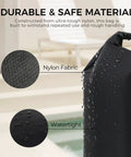 Close-up of travel compression laundry bag showing nylon fabric and watertight surface with text overlay.