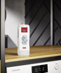 TwinDos Care Cleaning Agent For W1 Washing Machines Rinse TwinDos Dispenser Remove Deposits Keeps Auto Dispensing System Running Smooth Hygienic Results 1.4 L bottle on shelf