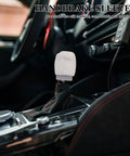 Get That Fresh And Breezy Fit With This Super Durable Gear Shift Knob Cover Kit Plus Breathable Brake Handle Grip Sleeve Made For Ultimate Comfort And Long lasting Style In Your Ride. gray handbrake sleeve on car lever