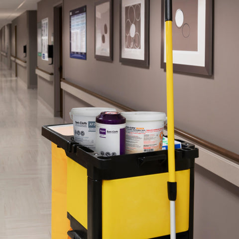 Cleaning cart in hospital hallway with Bleach Disinfecting Wipes For Hospital Grade Surface Cleaning In Bathrooms And Equipment