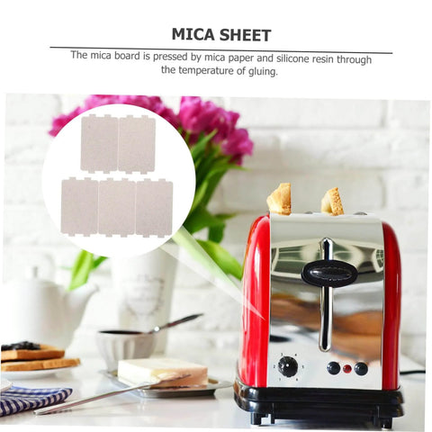 5 Pack Heat Resistant Mica Plates For Microwave Oven Universal Waveguide Cover beside a red toaster with toast