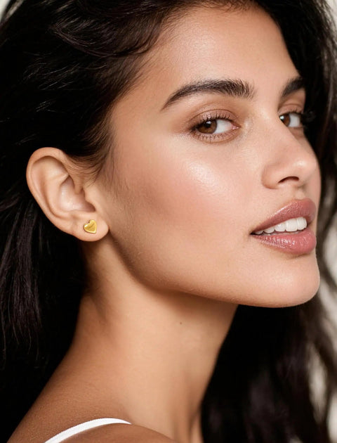 Implant Grade F136 Titanium Cubic Zirconia Stud Earrings Secure Screw Back Ultra Light Hypoallergenic For Sensitive Ears worn by a woman.