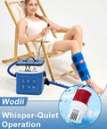 Person using Portable Leg Cold Therapy System For Calf And Shin Recovery After Surgery with 16 quart ice water unit in leisure chair