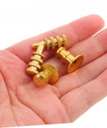 24 Pack Zinc Alloy Dowel Pins held in a hand, heavy duty metal furniture fasteners for cabinet shelf setup.