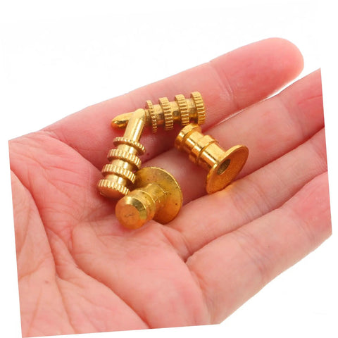 24 Pack Zinc Alloy Dowel Pins held in a hand, heavy duty metal furniture fasteners for cabinet shelf setup.