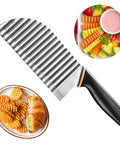 JAYVAR large stainless steel crinkle cutter with black handle; angled view shows wavy blade for potatoes and vegetables