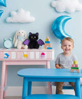Child in playroom with dresser featuring 8 Pack Ocean Sea Animal Wooden Cabinet Knobs Set With Tiny Turtle Decor For Nursery And Kids Rooms, Durable Wood Pulls For Dressers And Drawers, Includes Two Screw Lengths To Fit Different Thicknesses.