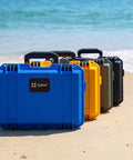 Colorful waterproof hard cases for DJI Mini 4 Pro Mini 3 Pro and RC transmitters RC 2 RC N2 N1 by beach, in multiple colors