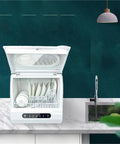Compact Portable Countertop Dishwasher Offering No Sweat Installation And Smart Auto Wash Cycles, open with clean dishes inside.