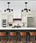 Four Light Black Farmhouse Chandelier With Adjustable Height Pendant Lighting For Dining Rooms above kitchen island with geometric design.