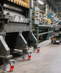 Installed ZDNEY 5x2 heavy-duty caster wheels (4-pack) with polyurethane tires and cast-iron cores on an industrial cart