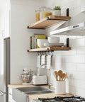 Beefy 8 Inch Shelf Brackets Four Pack For DIY Floating Shelves in kitchen with black powder coat supporting wooden shelves.