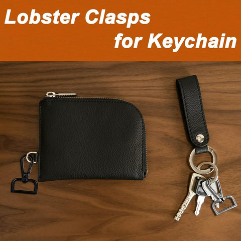 Hella Durable One Inch Zinc Alloy Swivel Snap Hooks With Pro Level Lobster Claw Clasps For Daily Carrying And Crafting Bringing A Crisp Black Feel To Any Project Six Pack attached to a black wallet and keychain.