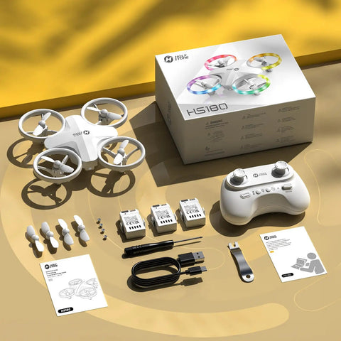 Beginners Drone For Kids With 3 Batteries And Easy Flight Modes HS180 One Key Start Altitude Hold 3D Flips Circle Fly Headless Mode Colorful LED Lights Great Gift For Boys And Girls showing drone, controller, and accessories