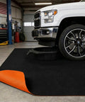 Oil Spill Mat For Garage Floor Absorbs Oil And Liquids With Waterproof Backing Keeps In Place Reusable Washable Heavy Duty 29 By 36 Inches Black And Orange To Protect Concrete From Stains under car
