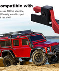 Easy Start ESC Trigger Power Switch For Traxxas TRX-4 1/10 RC Trail Crawler, red button shown with red RC vehicle on rocks