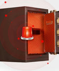Compact home safe box for personal valuables made from steel with shock proof construction perfect for cash passport jewelry and documents in cabinets or under bed, open door view with quilted interior and bold red accents.