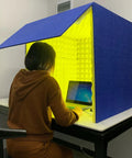 Solid Portable Desktop Soundproof Booth Cube Packed With Dense Acoustic Foam Panels for home studio vocal tracking in use.