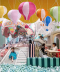 Hot Air Balloon Paper Lantern Decor Set Of 6 With Striped Blue Green Pink Orange Yellow Patterns 12 Inch Diameter And 16 Inch Expanded Height Perfect For Weddings Birthday Engagements Christmas Party Decor Party Ready Vibe hanging in a play area with children and ball pit
