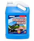 Heavy Duty One Gallon Windshield Washer Fluid With Tough Bug And Tar Blasting Blend For Darn Clean Streak Free Glass On Your Favorite Road Warrior Family Ride in blue jug.