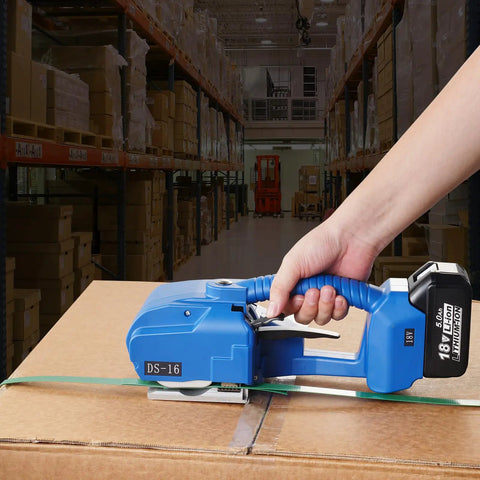 Top Shelf Portable Electric Strapping Machine For Smooth PP And PET Banding Operations With Dual Rechargeable Batteries and Clear Digital Screen in action sealing a box.