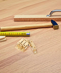 4 Pack Brass Ball Catch Door Latches For Cabinets And Drawers, Adjustable Double Ball Tension, with tools for home projects on wood table