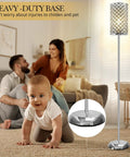 Baby crawling near Crystal Floor Lamp With K9 Crystals Tall Silver Modern Standing Light Luxe Accent Lamp