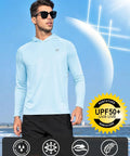 Man in skyblue Men's UPF 50 Plus Sun Shield Hoodie Rash Guard, Lightweight 4 Way Stretch Long Sleeve Shirt at the beach