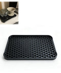 Hexagon Honeycomb Coffee Drip Tray For Countertop Organization And Pour Over Station Catcher on countertop with mugs and dripper.