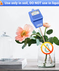 Practical Soil Moisture Meter For Plants And Garden Hygrometer Sensor for indoor outdoor use shown with flowers in a vase.