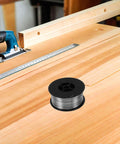 1KG Flux Core Welding Spool With Self-Shielding Metal Tin Wire For Precision Electronics Projects on a workbench.