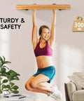 Wall Mounted Indoor Stair Railing Solid Pine Wood Handrail Heavy Duty Grab Bar With Non Slip Grip Built Tough To Handle Daily Use Supports Three Hundred Pounds - woman hanging from durable pine handrail.