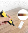 Wood Floor Repair Kit With 11 Color Matching Wax Sticks For Quick Scratch And Crack Fix, tool and wax stick displayed on wood floor