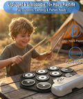 Child playing outdoors with Kid Friendly 9 Pad Electric Drum Set For Beginners Portable Roll Up Electronic Drum Kit.