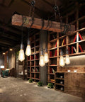 Rustic Farmhouse Chandelier For Dining Room Industrial Pendant Light With Six E26 Bulb Sockets in room setting