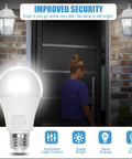 No-Fuss Dusk To Dawn Outdoor LED Bulbs 12W 6000K Cool White with Photocell Sensor beside door and light fixtures at night