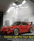 Beast Mode 300W LED Garage Light Delivers 30,000 Lumens Of Crisp 6500K Daylight with car under adjustable panels in garage