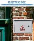 Weatherproof Outdoor Electrical Junction Box 300x400x160mm mounted on brick wall near green door.