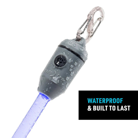 Side view of gray Nite Ize Radiant Rechargeable LED Glow Stick with Disc-O Select and carabiner clip, blue glow.