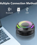 Dope Portable Wireless Shower Speaker With Digital Display And Detachable Hook IPX7 Waterproof LED Light shown next to a laptop
