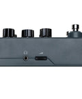Side view of POD Express Bass On The Go Ultra Portable Bass Amp Modeler with 7 Amps 7 Cabs 17 Effects and power jack
