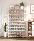 Heavy Duty Ten Tier Shoe Rack Wide Metal Organizer Tall Entryway Storage Shelf With Coat Hooks filled with shoes and storage bags.