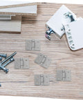 Outanaya barn door hinges, metal silver, six hinges with mounting screws on wood surface