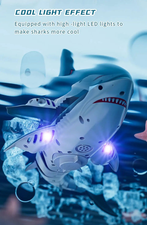 Lit Remote Control Shark Boat With HD Camera Water Sprayer Dual Motors 2.4G RC Racing Boat in water with LED lights glowing