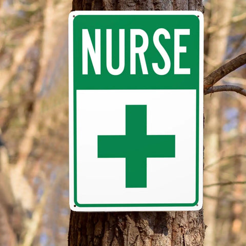 First Aid Station Nurse Symbol Safety Warning Sign 8x12 Aluminum Plaque for Clinic shown outdoors