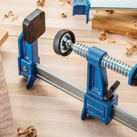 18 Inch Sure Foot F Style Clamp with No Tip Base on workbench for hands free positioning one hand setup versatile woodworking clamp