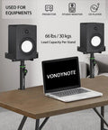 Set Of 2 Dual Side Clamping Studio Monitor Stands For Desktop on wooden table with laptop