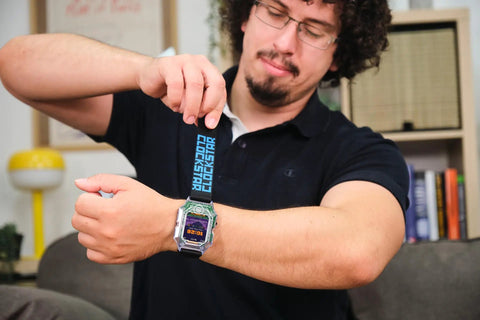Man wearing Clockstar 2.0 DIY Smartwatch Kit Build and Code Your Own Wearable Tech Learn Real Electronics and Coding in a Hands On STEM Gift for 11 Plus Kids and Teens on wrist